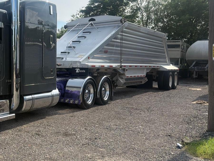 AREN gray Peterbilt with a bottom-dump / belly-dump trailer